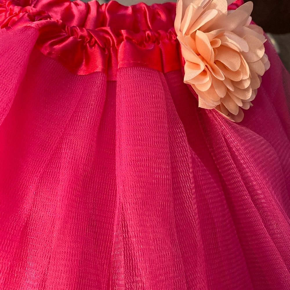 Pink Childs tutu with pink flower at waist